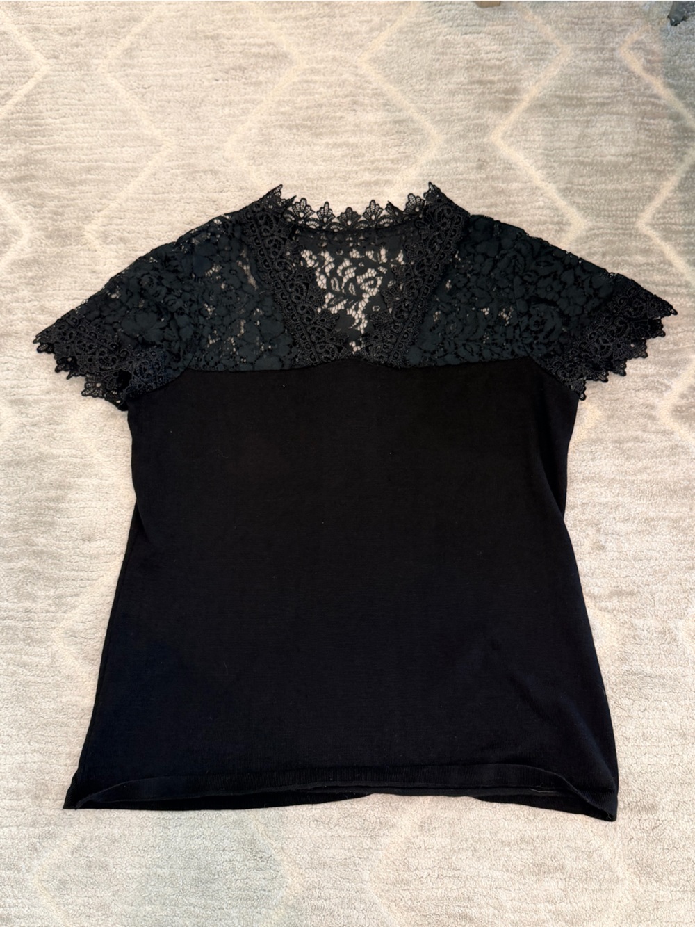Andrea Jovine black top with lace v-neck trim, size M